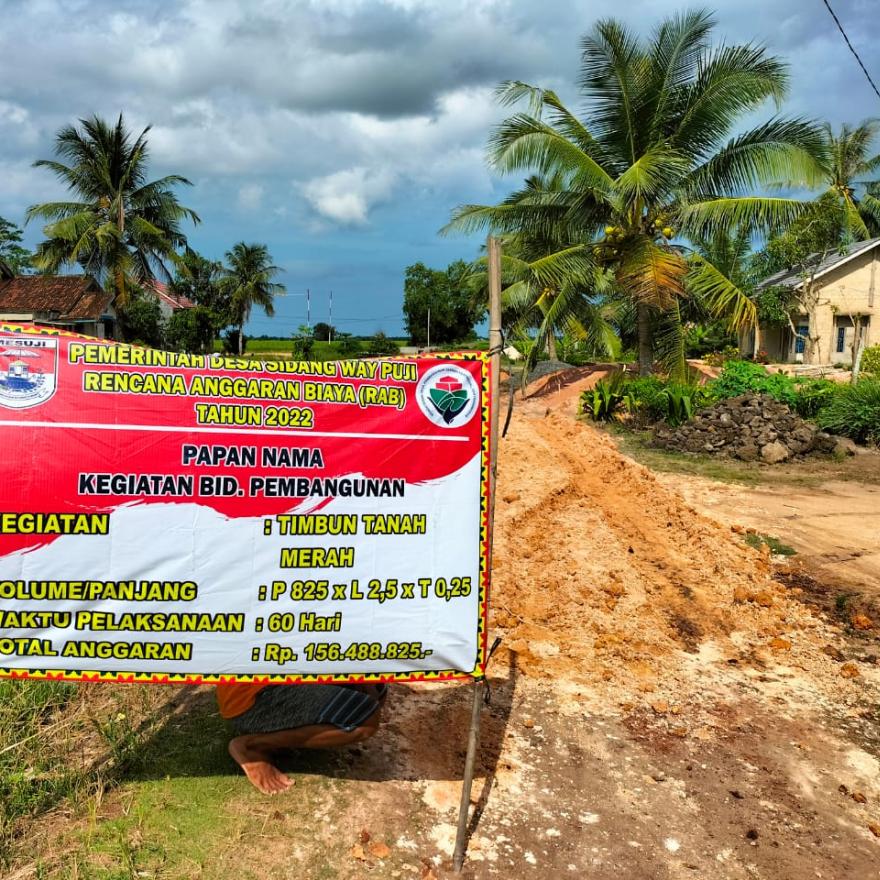 Peningkatan Jalan Penimbunan Tanah Merah Desa Sidang Way Puji